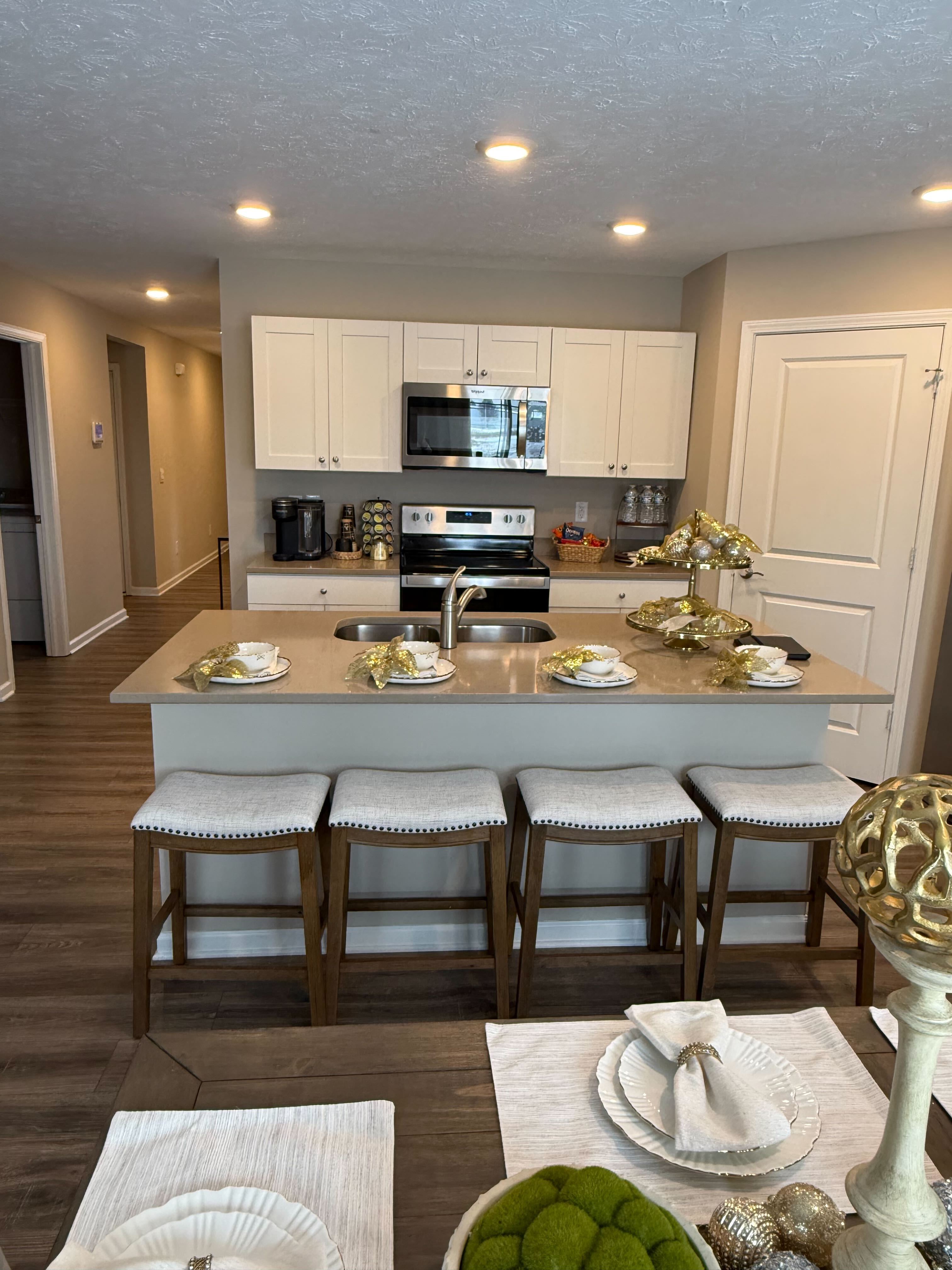 Model home kitchen with island seating