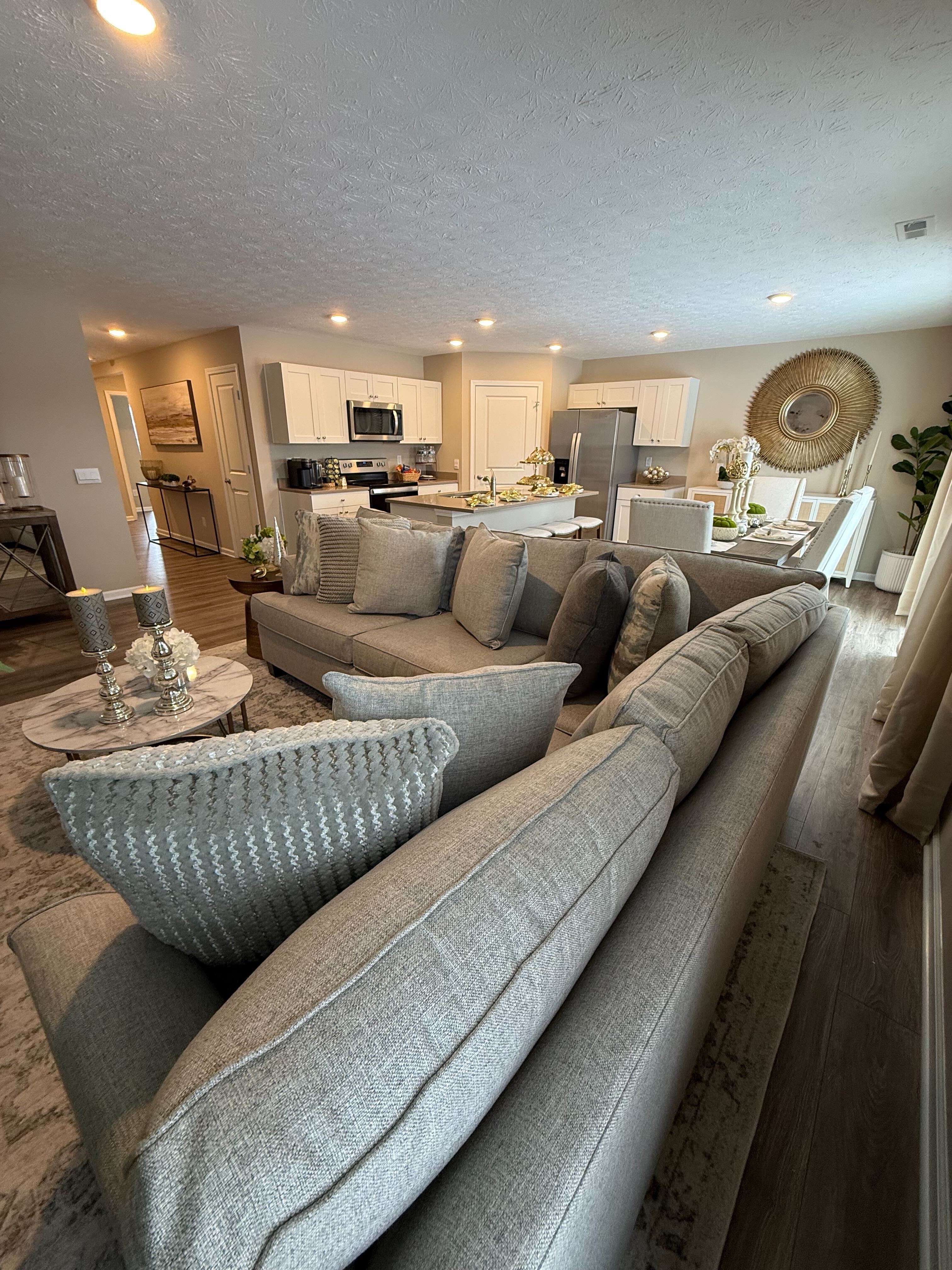Model home open-concept living room with kitchen